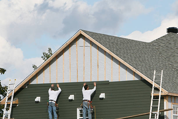 Professional Siding technician working in Wayne, PA